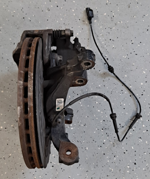 Zwrotnica piasta tarcza zacisk hamulcowy jarzmo czujnik ABS Jeep Compass 2017-2018 68259529AB